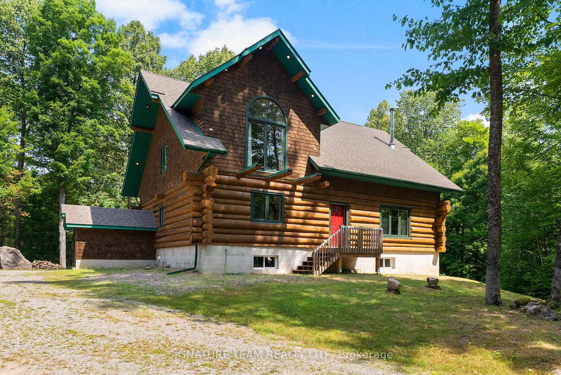 Set amidst 14. 95 acres of mixed hardwood forest minutes from Pembroke, this extraordinary custom built log home offers a rare blend of artisanal craftsmanship and refined rural living.
