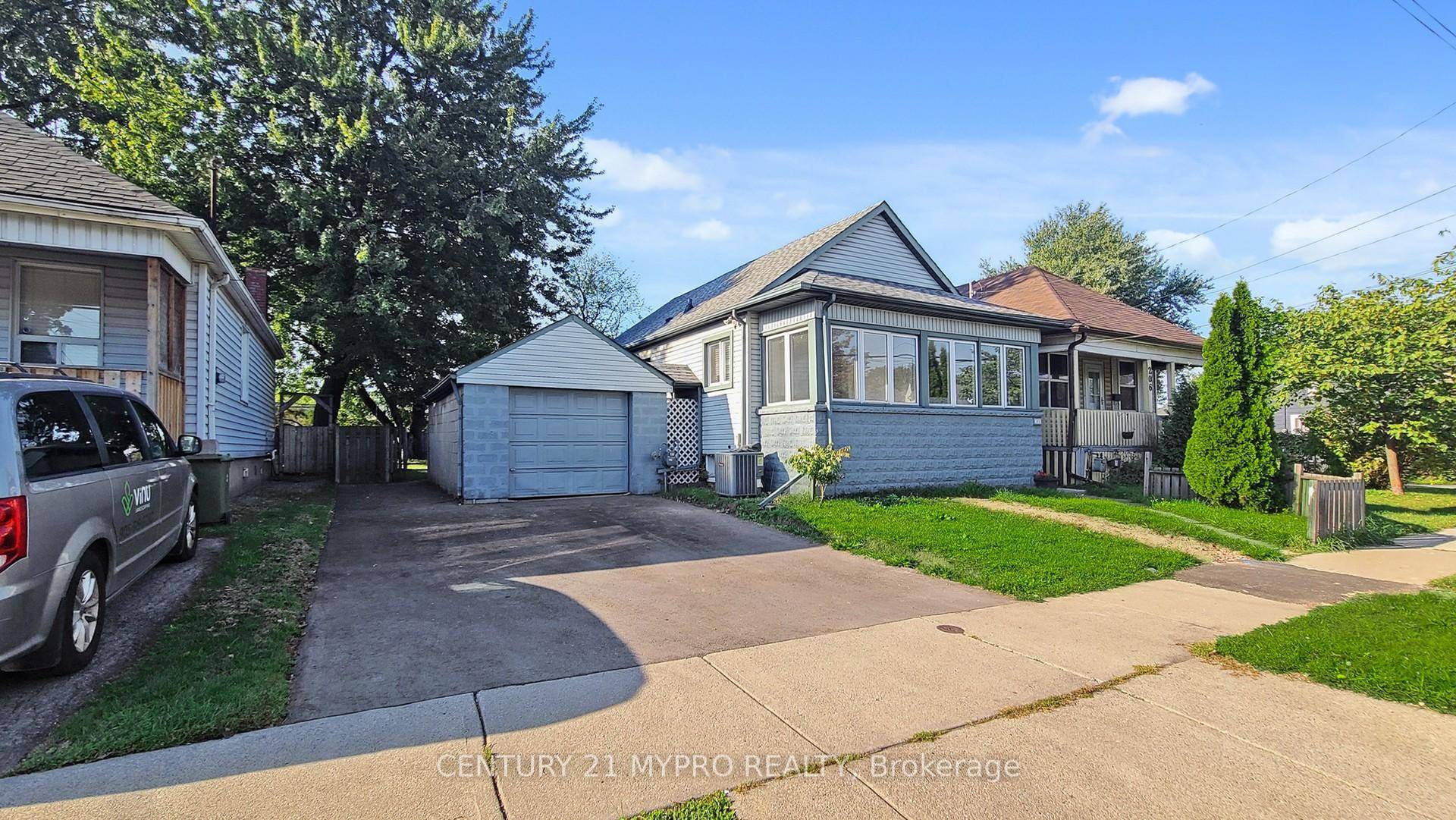 Welcome to Charming 3 Br home on the 50' x 100' Ft Lot with spacious driveway parking 2 cars can park side by side amp ; Detached garage.