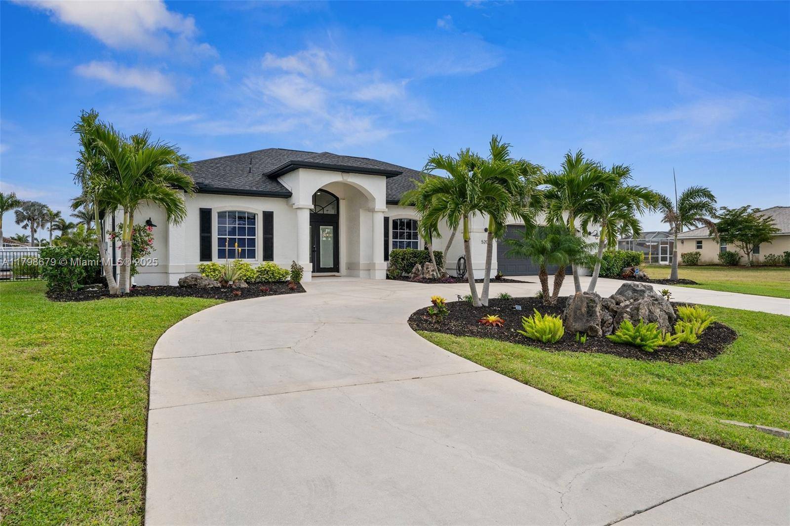 Live the ultimate SW Florida lifestyle in this updated Gulf access pool home near Cape Harbour.