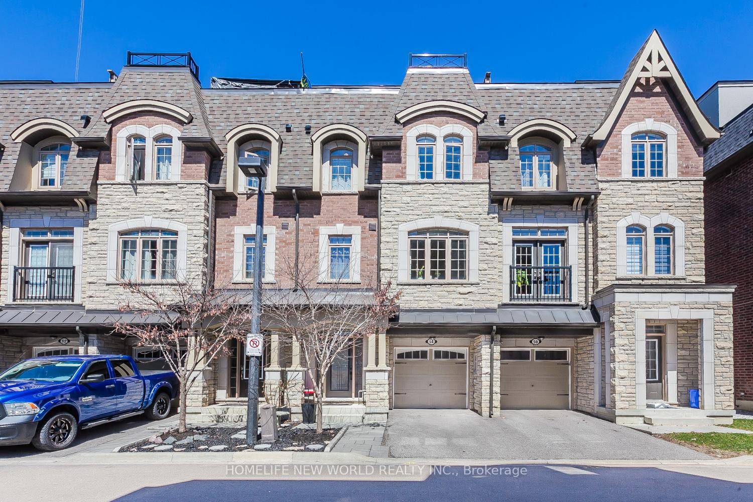 Absolutely Stunning Sun Filled Beautifully Maintained Freehold Townhome with Finished Basement.