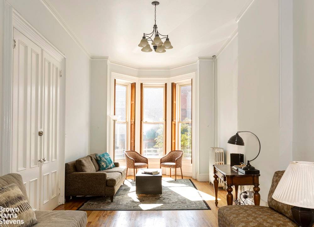 Two family, 3 story cellar brownstone on 20 x 90 foot lot.