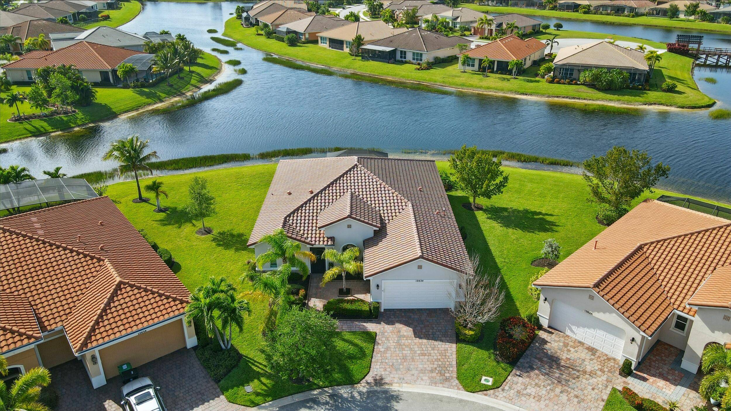 Lakefront luxury meets modern comfort in this 3BR Den, 3BA gem nestled in a cul de sac !