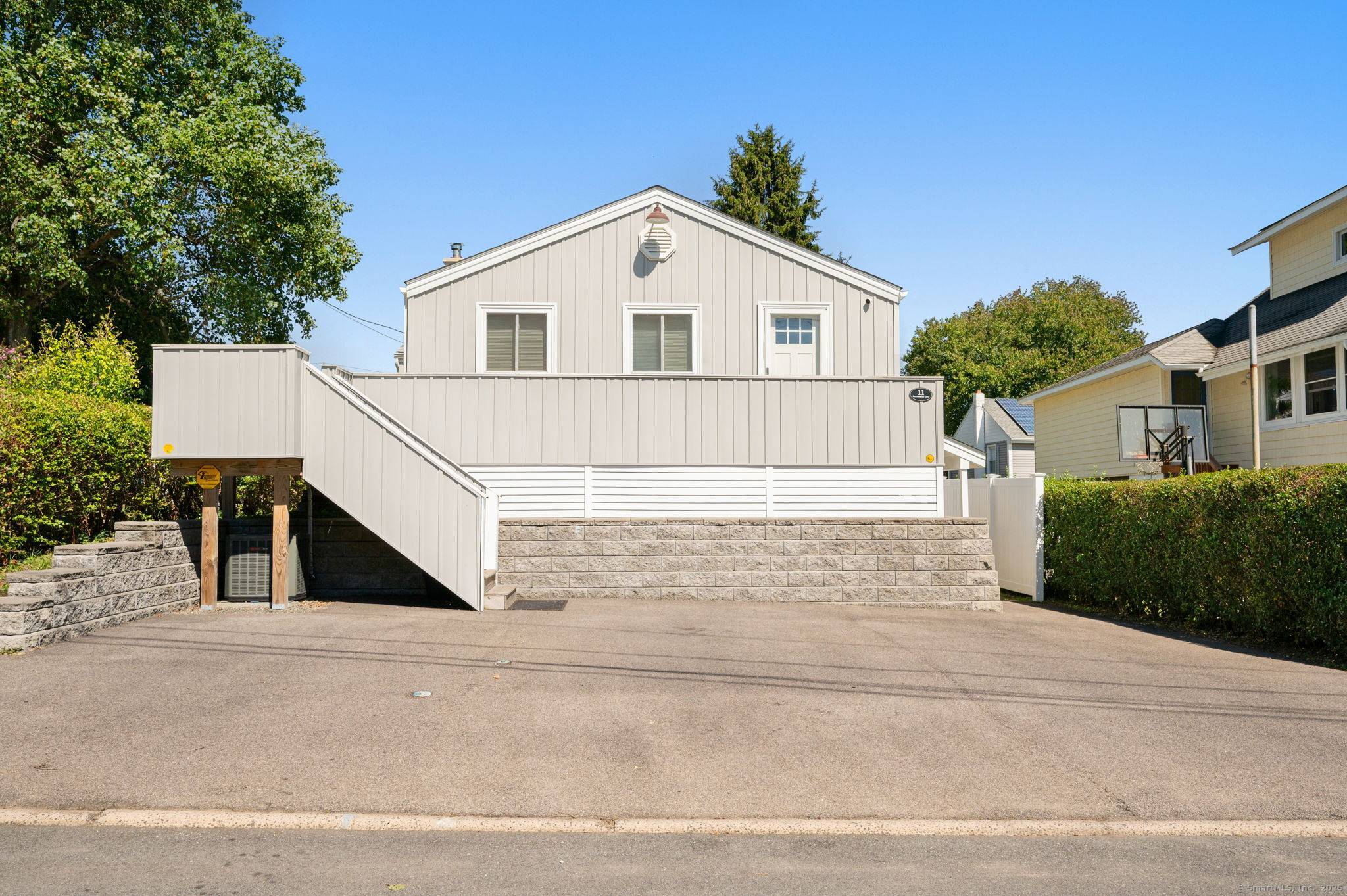 Enjoy coastal living in this adorable beach cottage nestled in the desirable Ridgewood Park neighborhood by Alewife Cove, just a short stroll to Ocean Beach, Waterford Beach, and the scenic ...