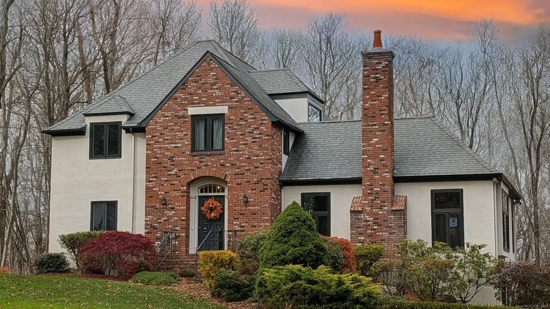 Timeless French Colonial Luxury in a Premier Ridgefield Enclave !