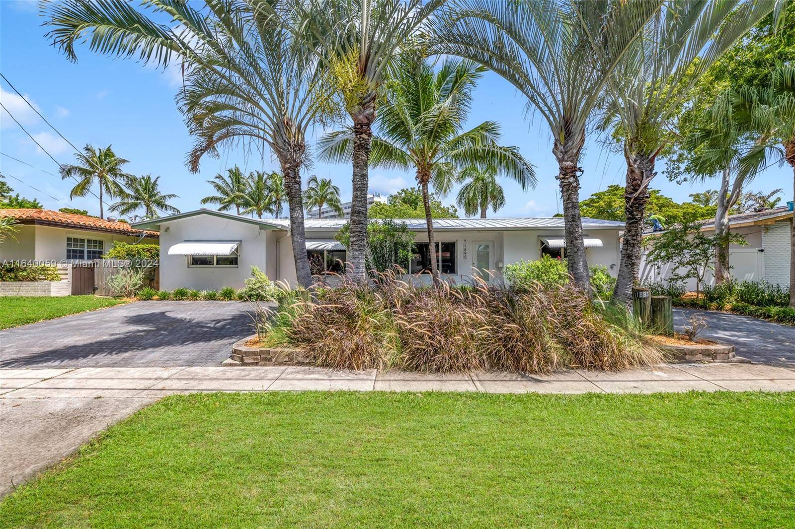 This stunning and completely renovated turnkey waterfront home offers direct ocean access with no bridges to the bay, making it a perfect retreat for boating enthusiasts.