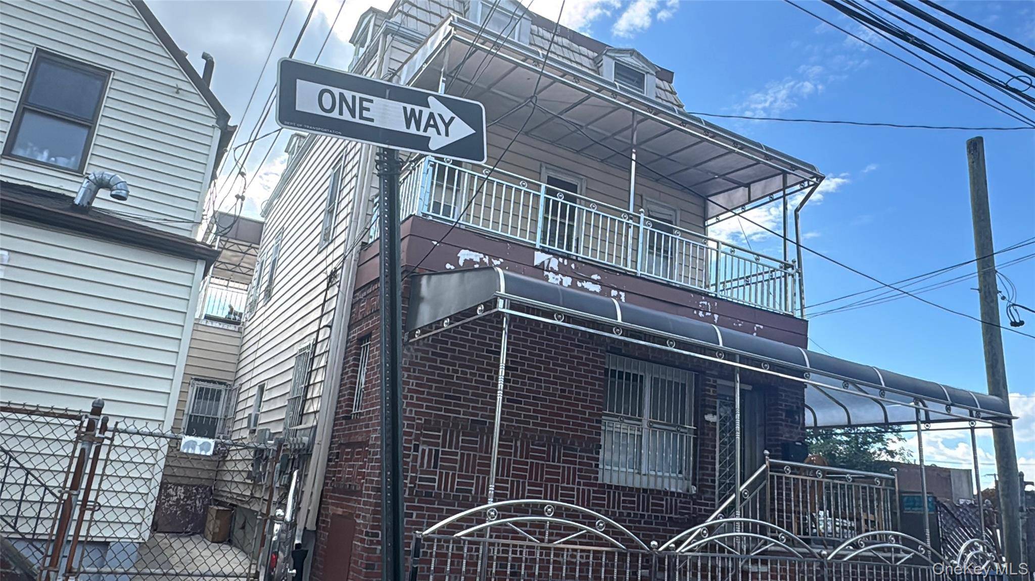 Prime Flushing Location Legal 3 Family Excellent Condition Welcome to this beautifully maintained legal 3 family brick home nestled on a quiet residential street in the heart of Flushing.