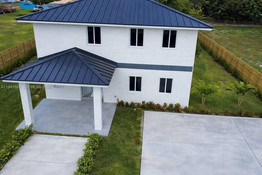 Modern style family home just off Exit 1, ideally located just minutes from the beautiful Florida Keys !