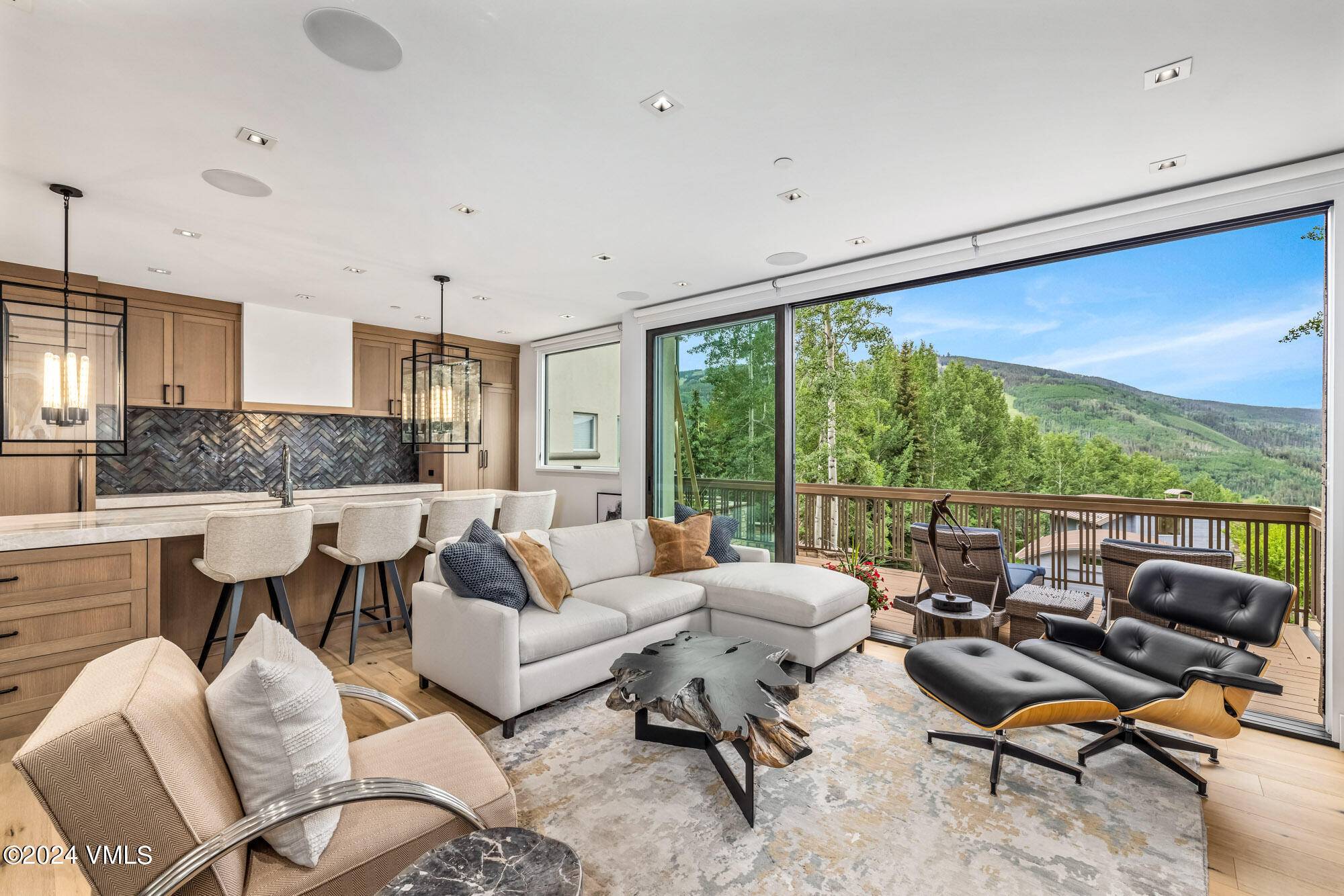 Embrace the breathtaking beauty of Vail, Colorado, from this exceptionally remodeled Judge and Associates residence offering unparalleled panoramic views of the ski slopes and surrounding mountains.