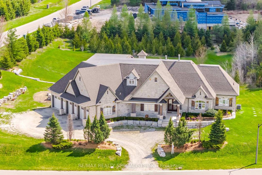 Welcome to 1 Edgewild Drive, an extraordinary custom residence situated on one of Caledon's most prestigious and sought after streets, offering breathtaking views and exceptional privacy.