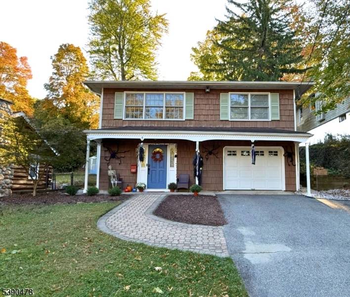 Welcome to your new sanctuary in the heart of one of Wayne's most sought after neighborhoods, Packanack Lake !