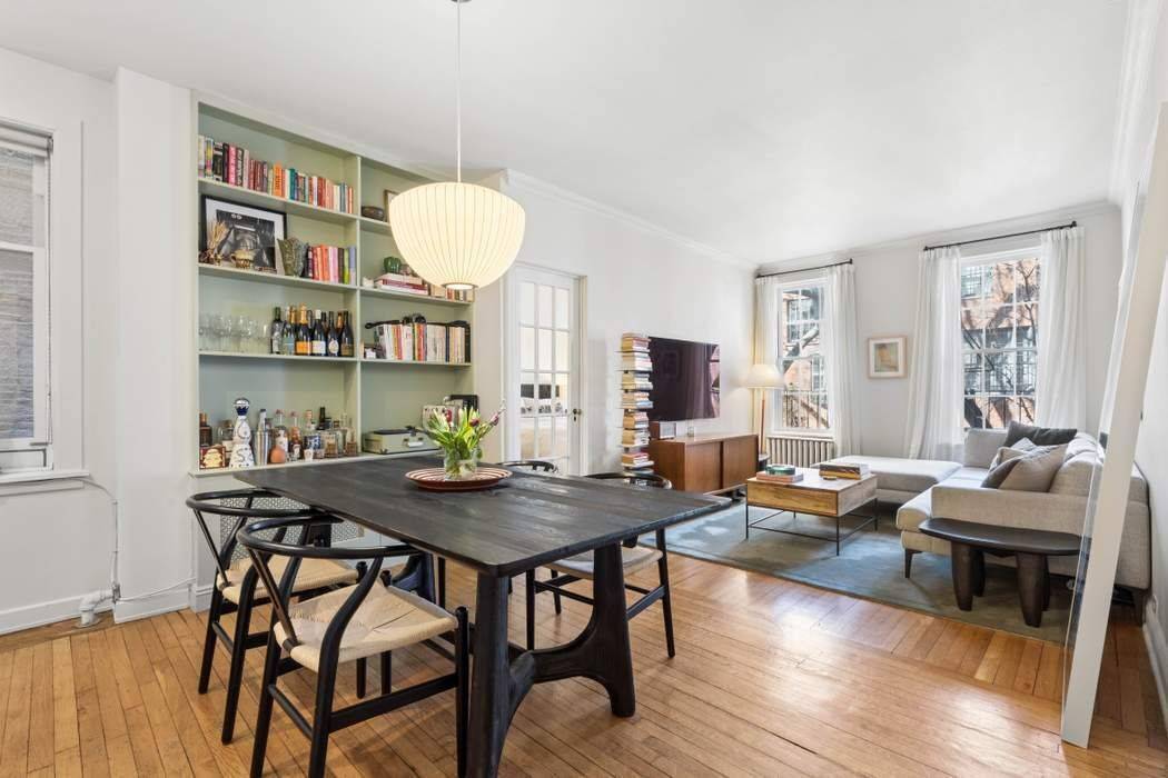 Situated on a tree lined stretch of Perry Street between West 4th and Bleecker Streets, Apartment 2R is the quintessential West Village home.