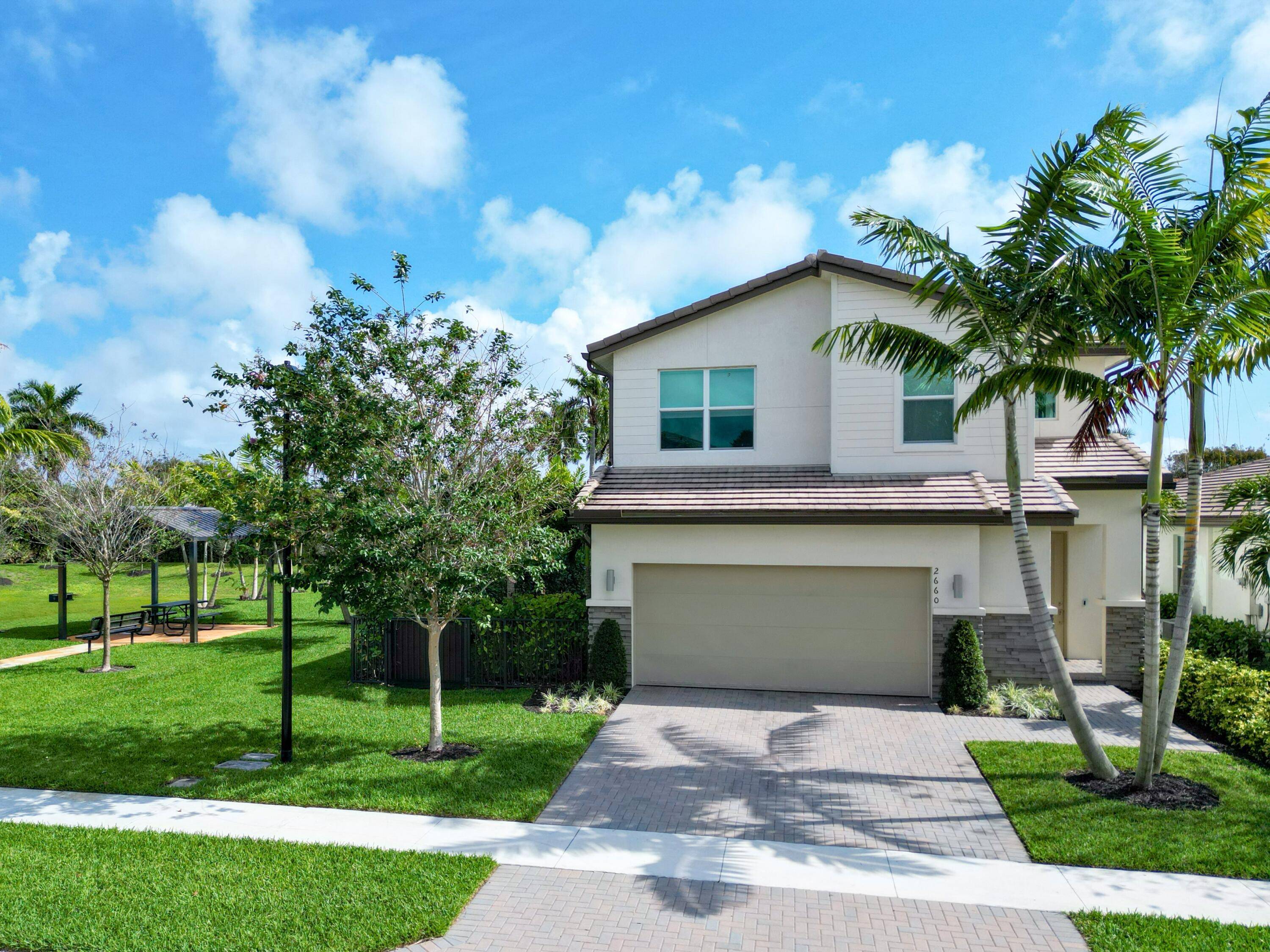 RARELY AVAILABLE home in NEWER Country Trail custom home community.