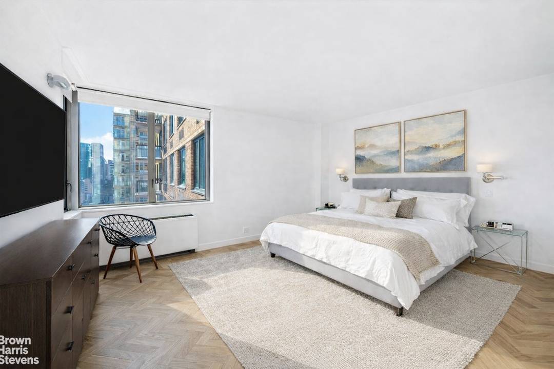 Welcome to Apartment 24L at 300 East 54th Street, a bright and inviting residence high above Midtown East with sweeping open views and abundant natural light throughout the day.