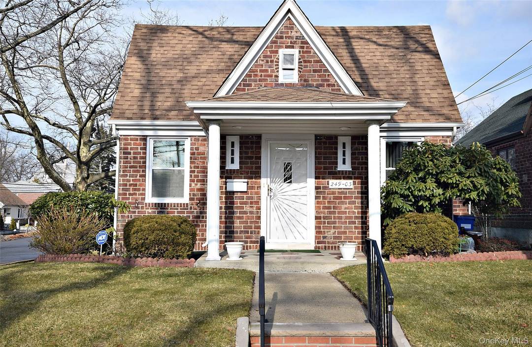 Beautifully maintained one level home on a landscaped, tree lined street with desirable southern exposure.