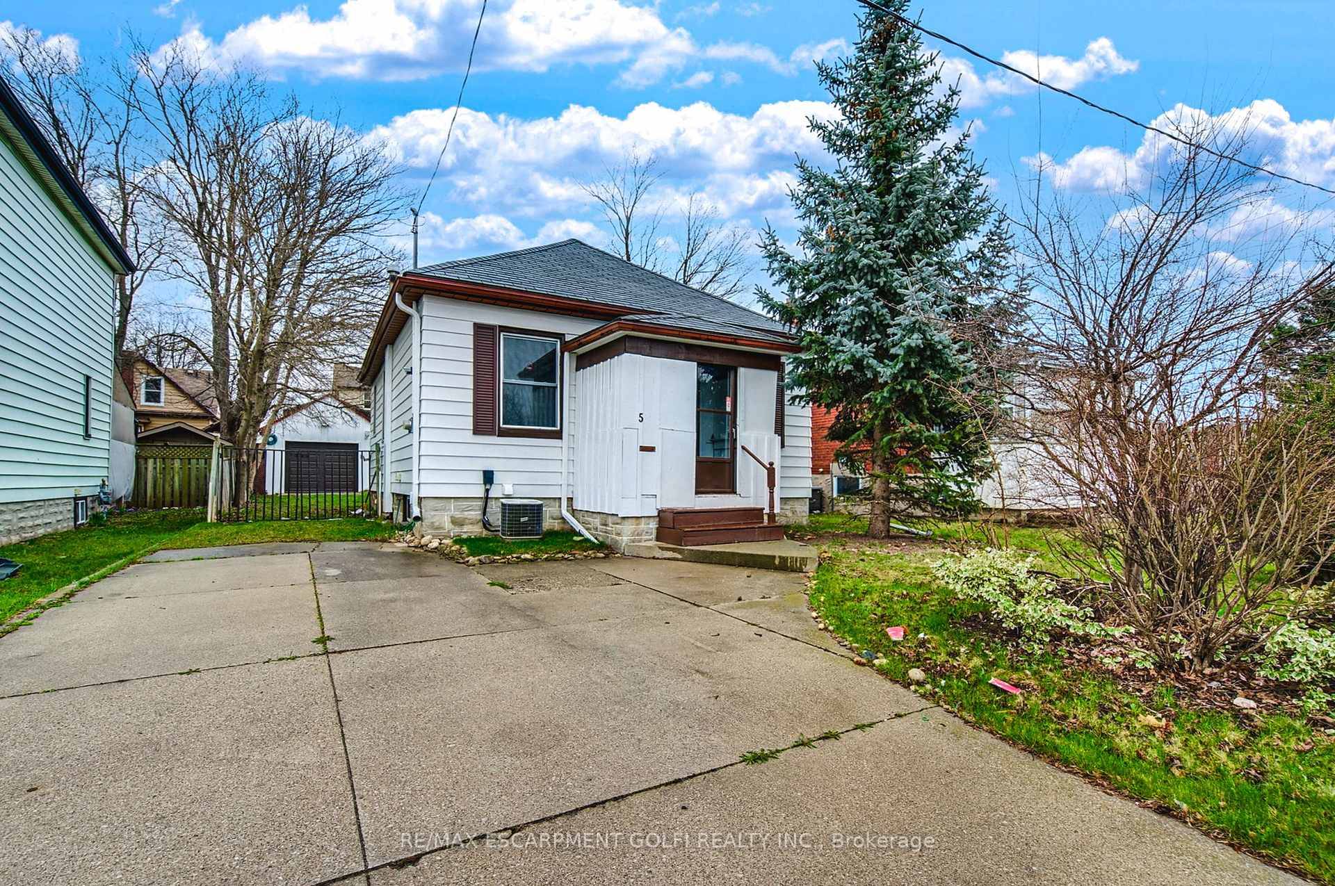 This stunning bungalow on a cul de sac, boasts incredible curb appeal, complete with a 1 car detached garage and an enclosed private backyard.