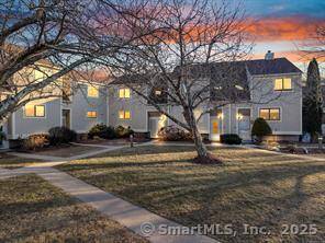 Summerwood on the Sound. Step into this stunning townhouse condominium featuring a fabulous kitchen with spacious quartz counters and breakfast bar, custom designed cabinetry and stainless steel appliances.