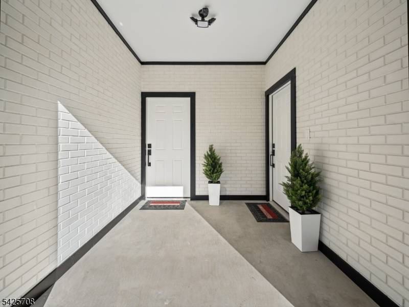 Brand new side by side two family home in red hot Carlstadt.