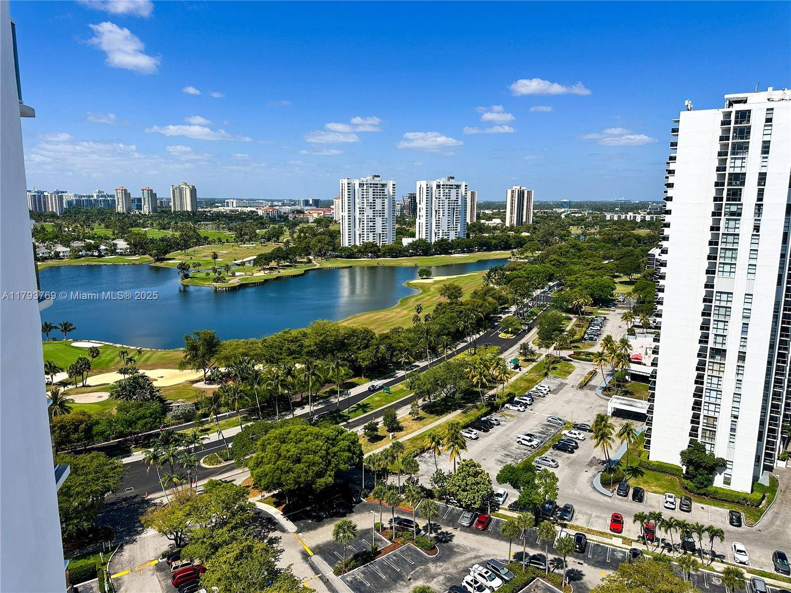 LOCATION in the heart of Aventura, a very bright corner unit with spectacular views of the Aventura Golf Course, the Intracoastal Waterway, and the ocean.