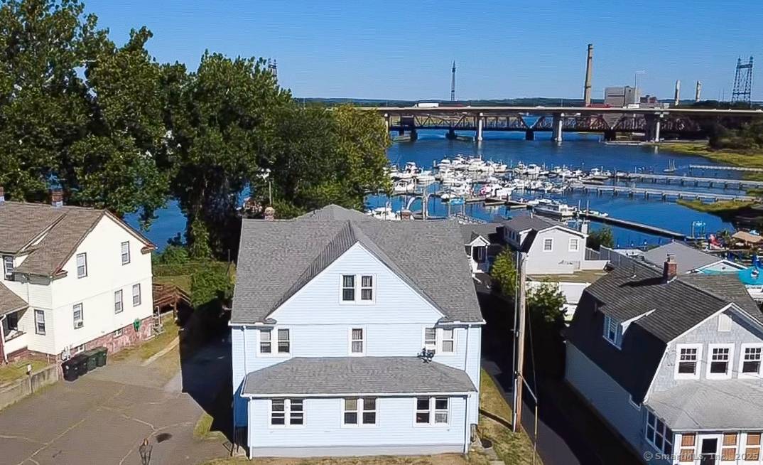 Nestled in one of Milford's most picturesque locations, this 3 family property offers direct frontage on the Housatonic River with sweeping water views.