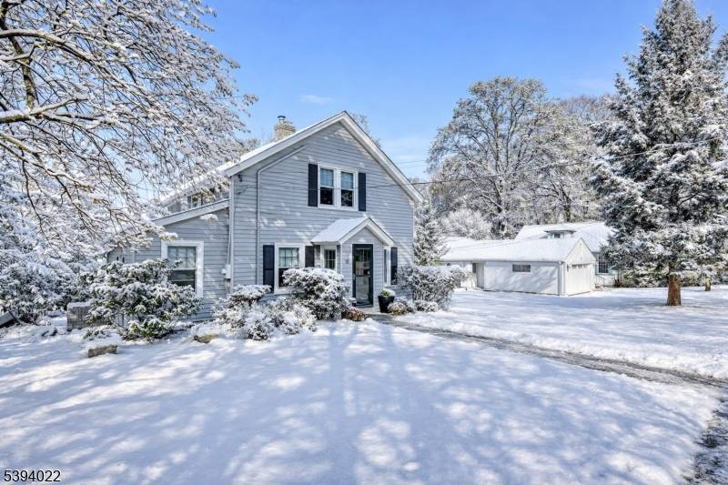 Welcome to this bright and charming Colonial, perfectly tucked away on a quiet cul de sac yet close to everywhere you need to go.