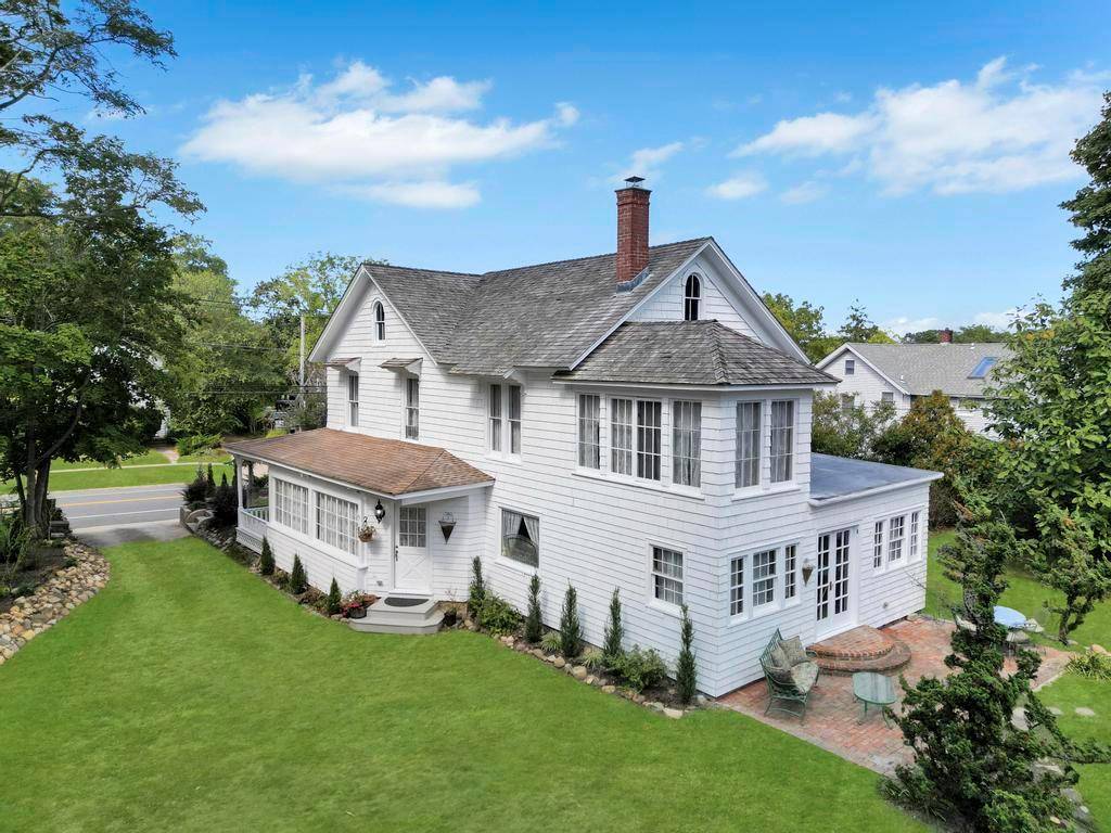 Nestled in the heart of the Historic District, this enchanting 1870 Victorian Farmhouse offers timeless elegance and a rich sense of history.