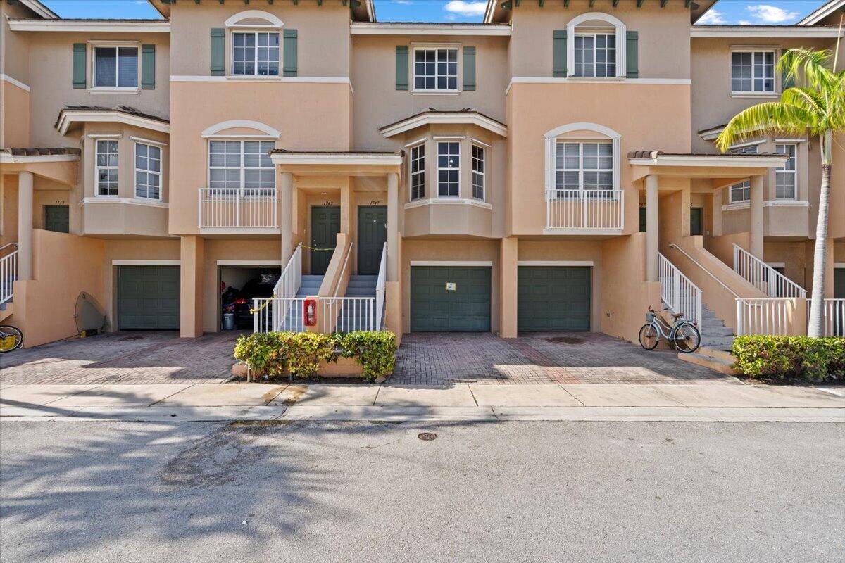 This stunning 3 bedroom, 3 bathroom condo with a 1 car garage offers versatile living in a secure gated community.