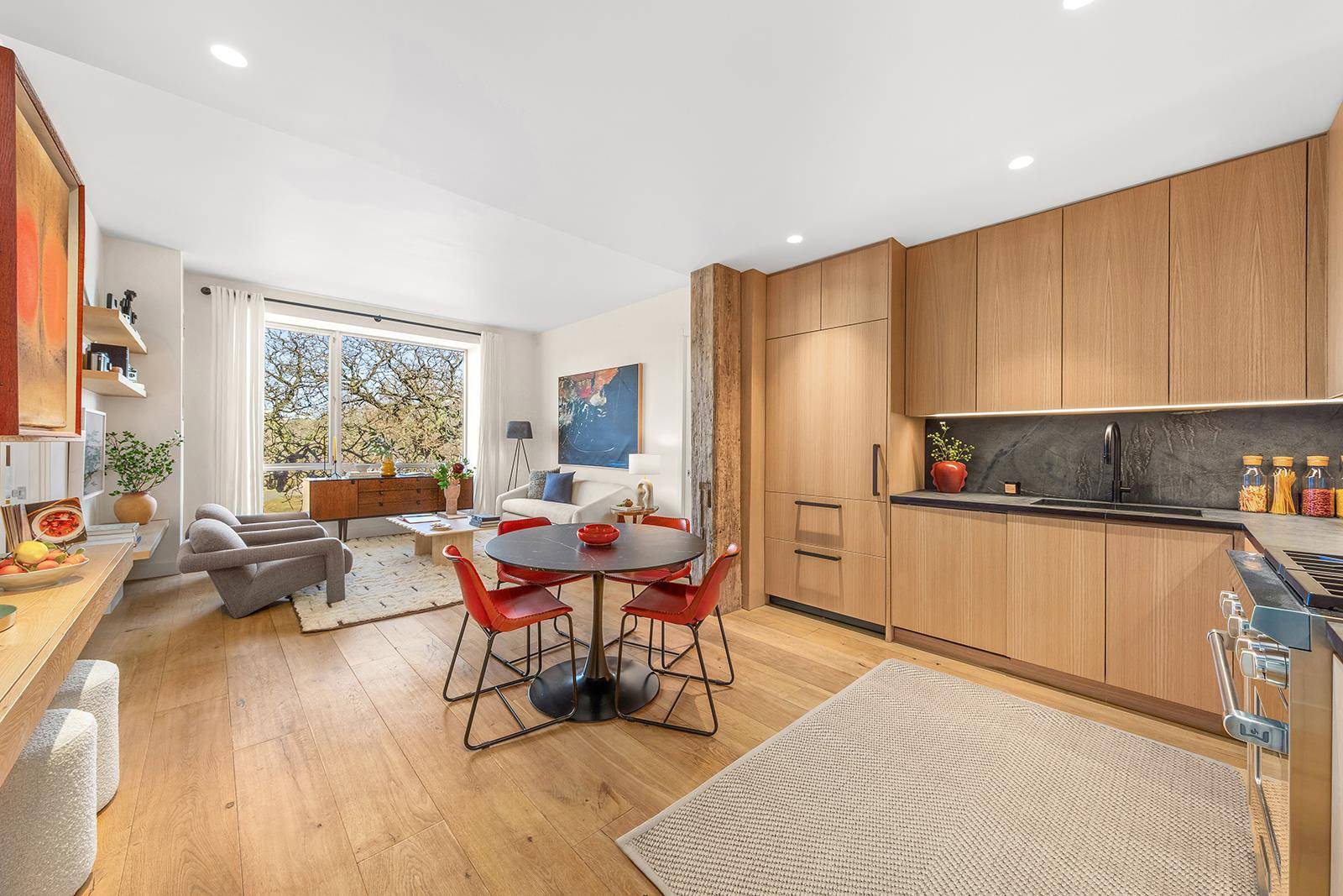 The Eklund Gomes Team at Elliman presents this perfect, chic, airy, RENOVATED 2 bedroom, 2 bathroom designer condo across the street from McCarren Park in Williamsburg !