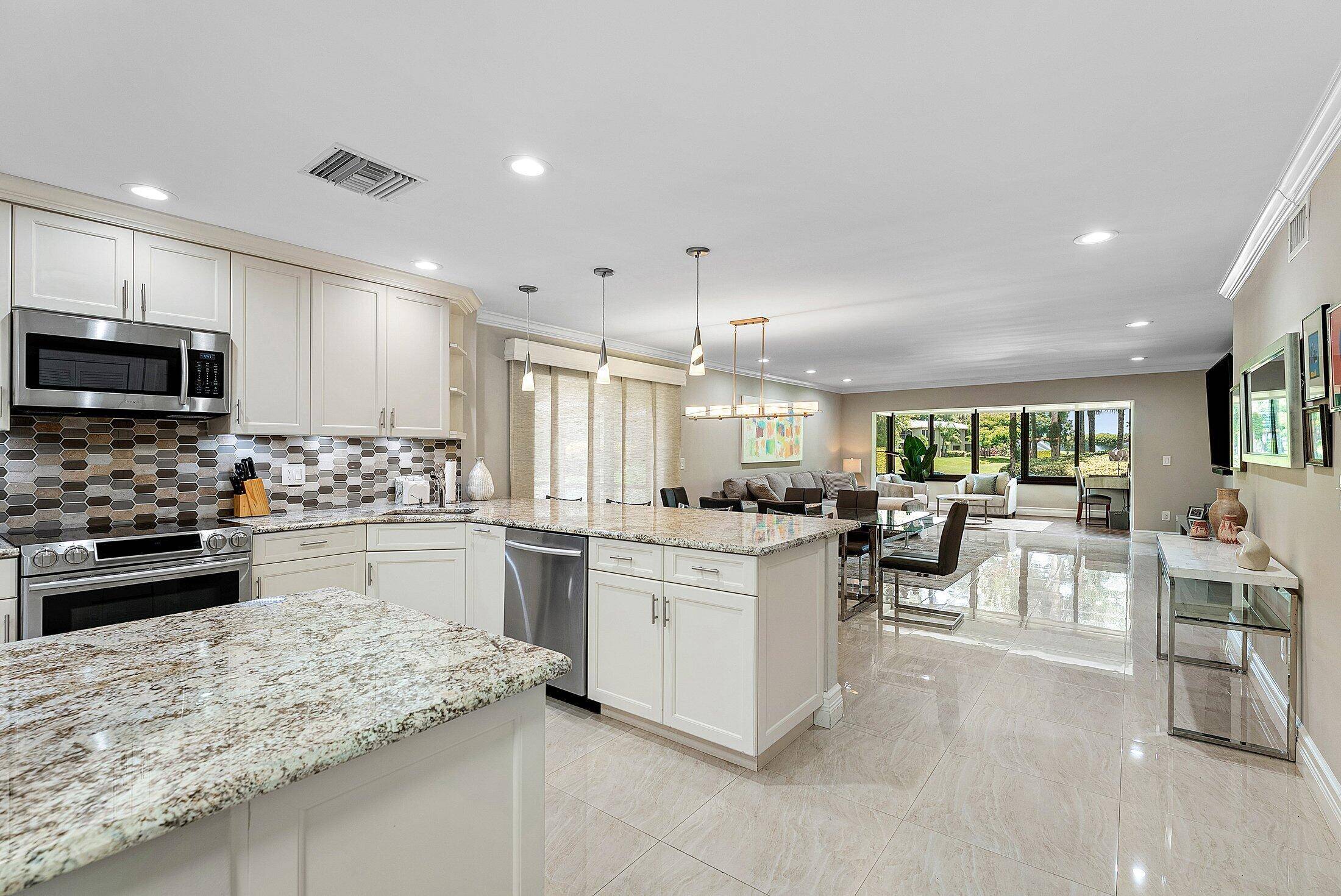 Experience luxurious living in this beautifully renovated 1st floor corner condo, ideally located just steps from the subdivision pool in the highly sought after Hunters Run Country Club where every ...
