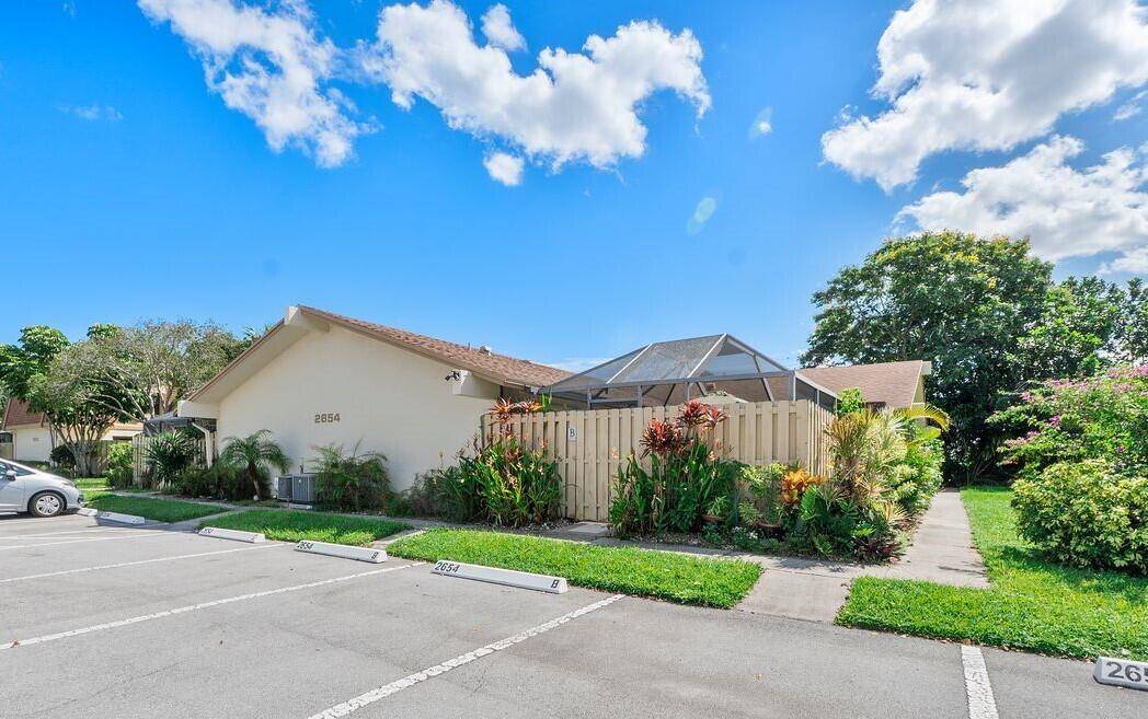This beautifully renovated 2 BR 2 BA villa is located in gated Rainberry Bay, a 55 vibrant community with walking trails around the central lake.