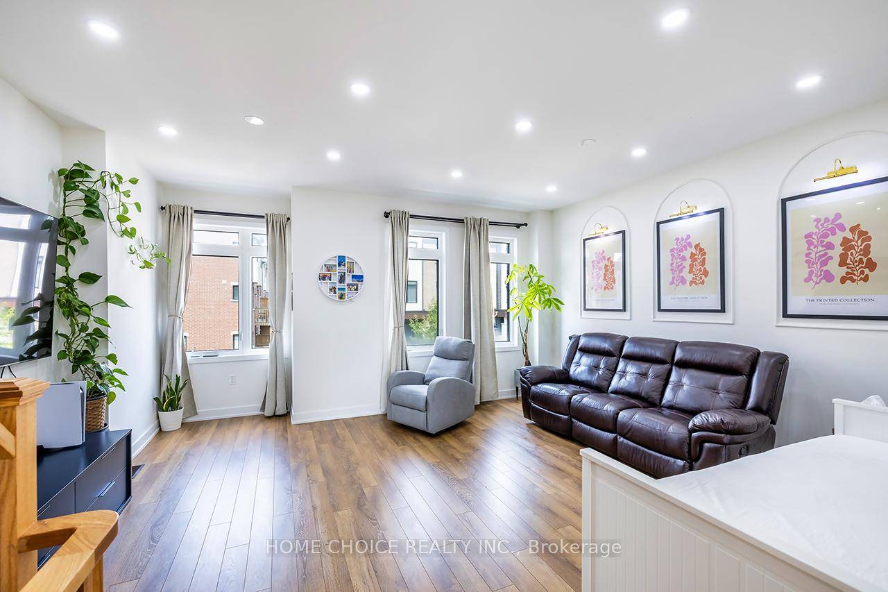 Discover this stunning contemporary home, an exclusive three story townhome that radiates elegance with its designer features and luxurious finishes.