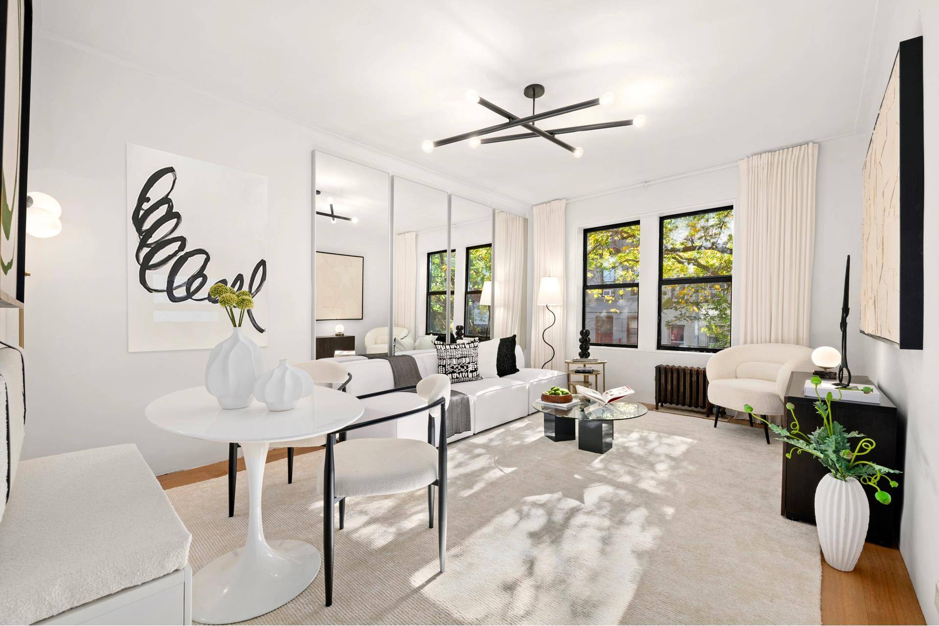 Beautifully Renovated Prewar 2 Bedroom in East Village Art Deco Building Awash in sunlight, this elegant south west corner prewar 2 Bedroom 1 Bath with 9 ft.