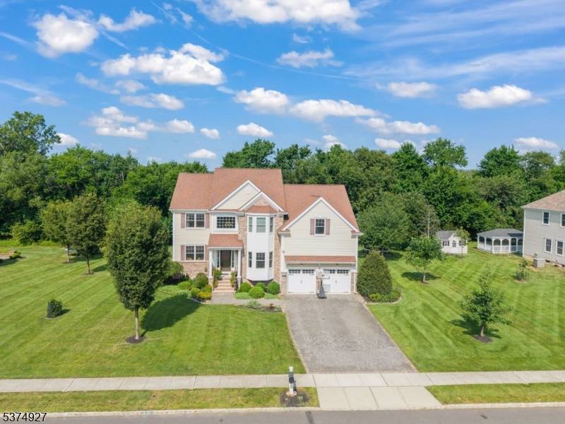 From its elegant curb appeal to its thoughtfully designed layout, this five bedroom, five and a half bath residence blends everyday comfort with polished sophistication.
