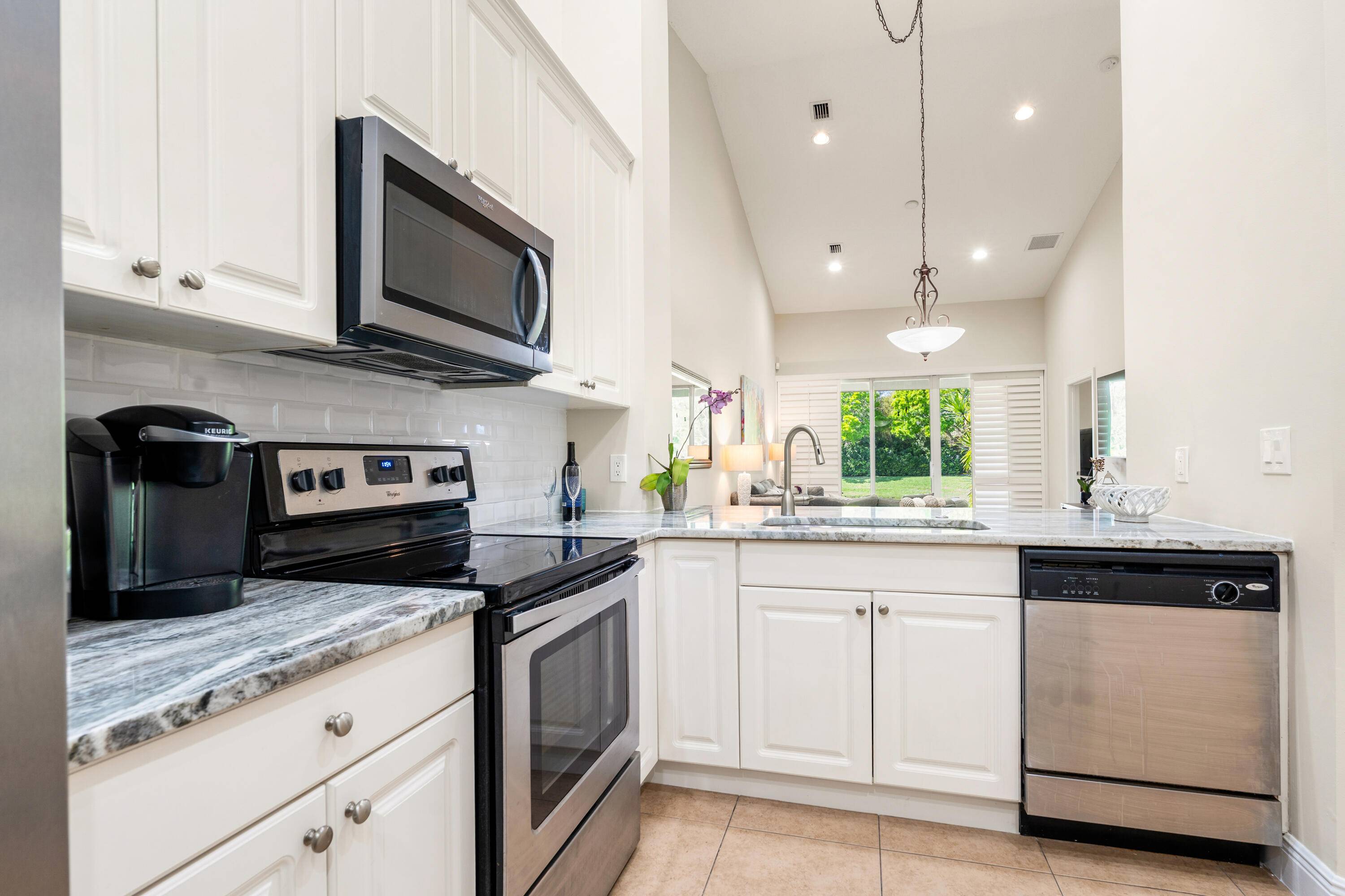 Just Renovated 2 bed 2 bath 2006 corner waterfront townhouse with many upgrades in Vero's Top Tennis community.