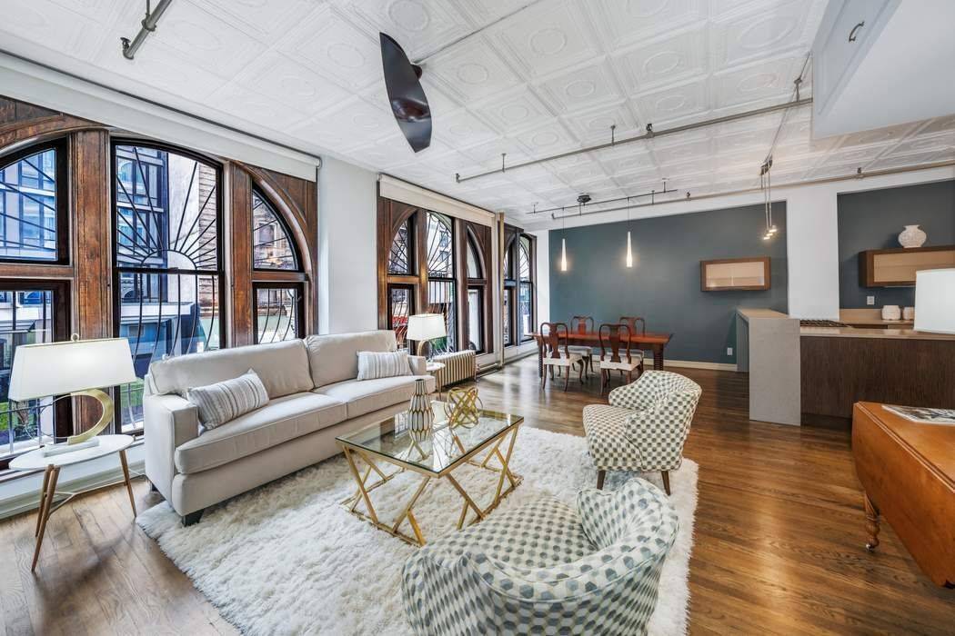 RESIDENCE Seize this rare chance to own an authentic loft in New York City s vibrant Flower District !