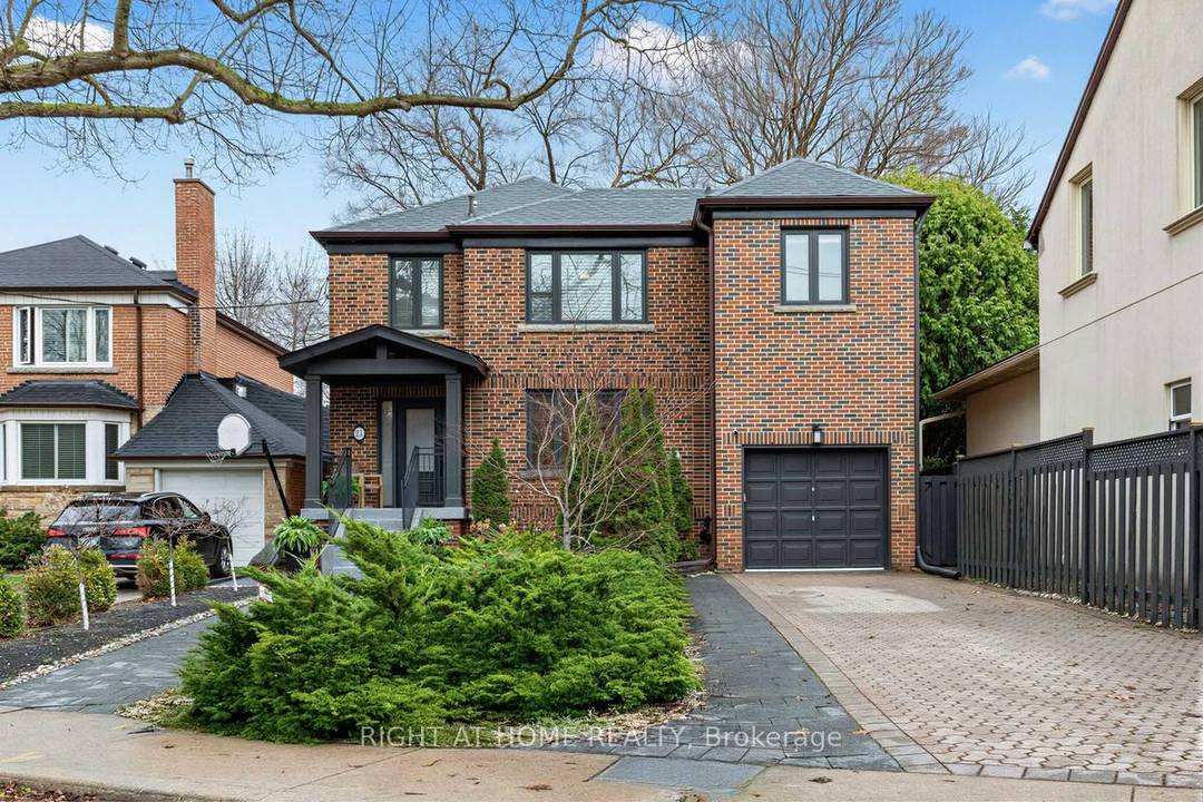 Welcome to an exceptional, fully reimagined residence on one of Casa Loma's most distinguished streets.