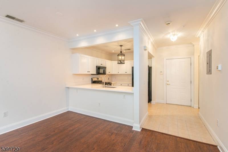 Welcome home to this beautiful 1 bedroom, 1 bath condo with a spacious den perfectly blending modern comfort and natural tranquility.