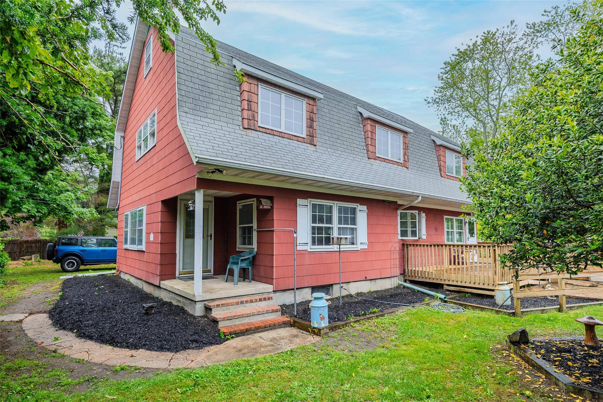 A large colonial home with plenty of space for all your needs on a level 140x100 lot property with an unbelievable 3 car garage with a 10ft door.