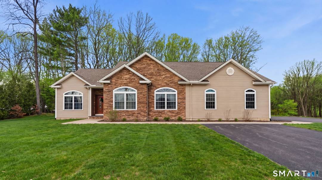 Welcome to this one of a kind custom built ranch tucked away on a quiet cul de sac in one of Wolcott's desirable neighborhoods.