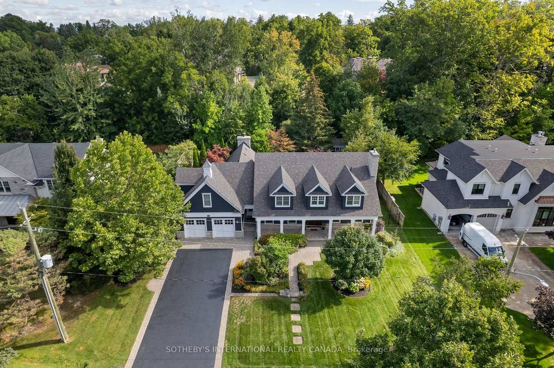 Elegant Cape Cod inspired masterpiece set on a quiet cul de sac in prestigious Southeast Oakville.