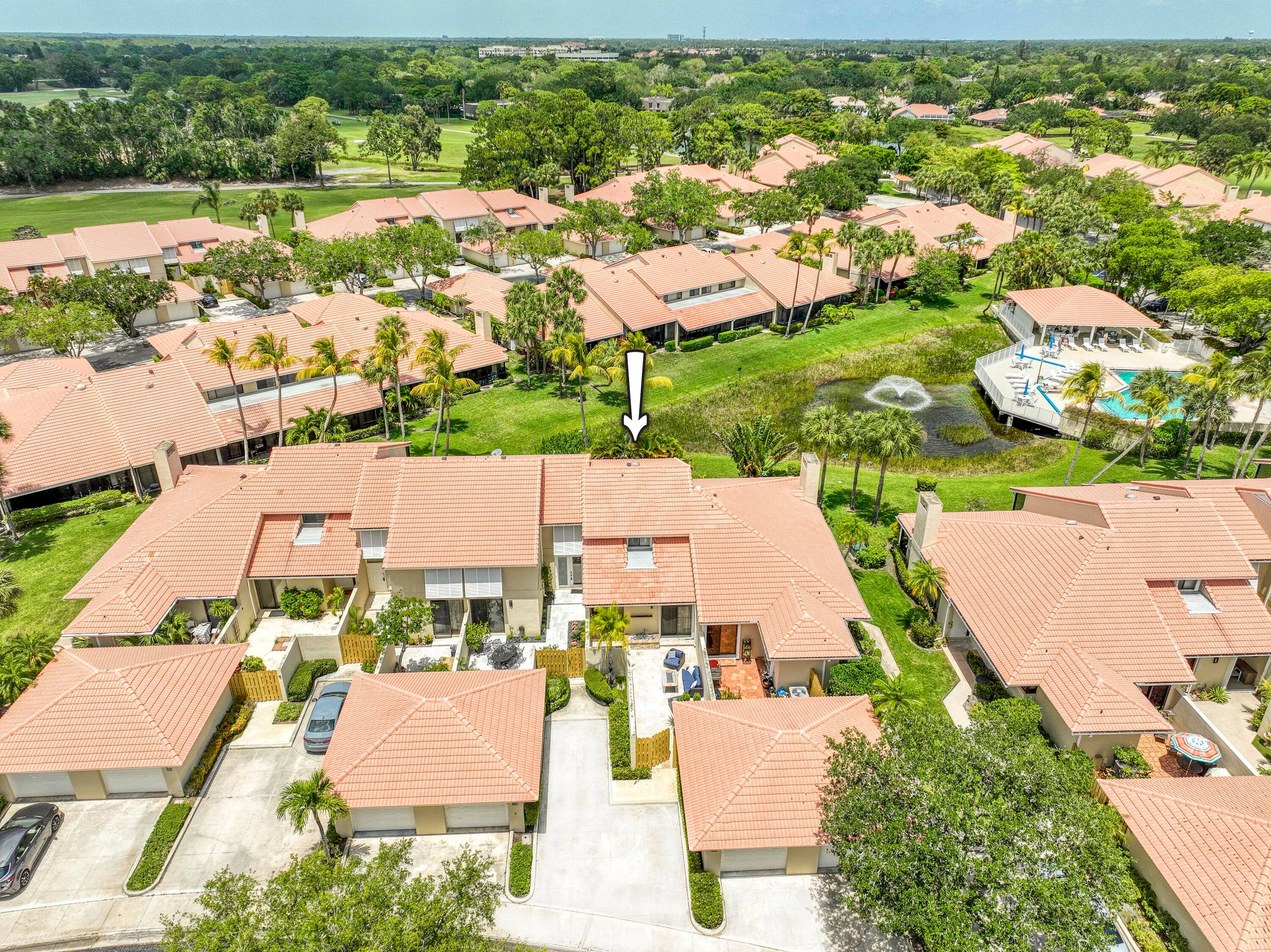 Discover comfort and charm in this well maintained, light filled 2 bedroom, 2 bath townhome, located in the highly sought after Patio Homes community of PGA National.
