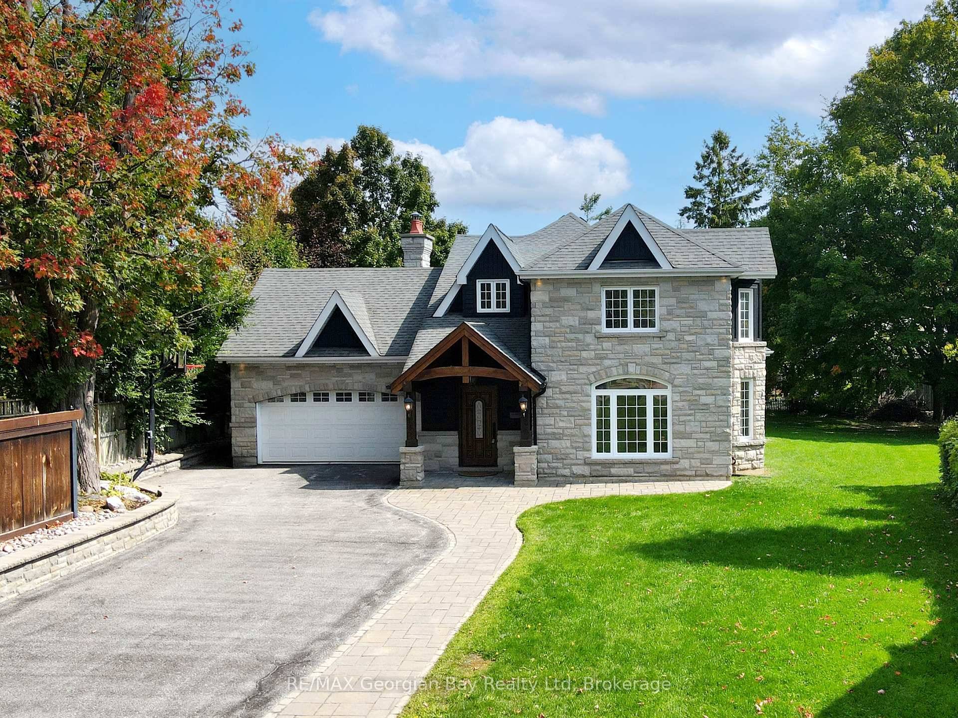 Welcome to this beautifully updated 2 storey home on a rare half acre lot in Barrie's sought after Codrington community.
