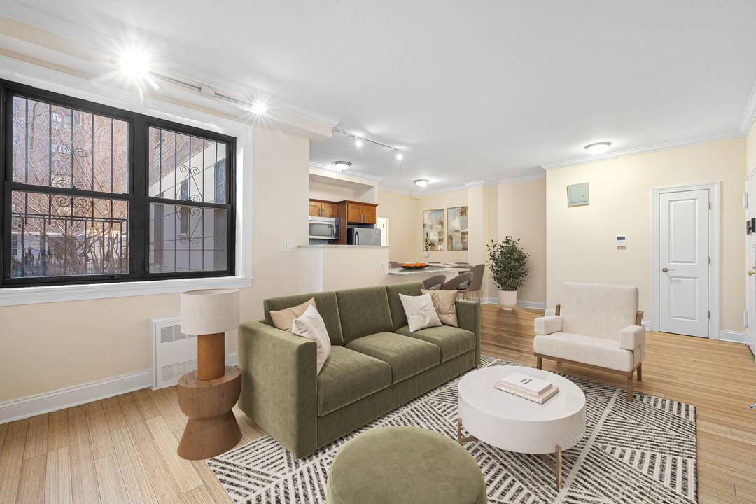 Sun flooded 2 bedroom, 1 bath home in Hudson Heights with south facing windows overlooking the quiet Bennett Courtyard for a peaceful garden view.