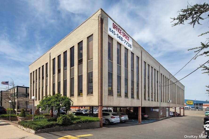 Prestigious 23 unit office building with medical professional tenants featuring first floor parking, building lobby, and elevator.