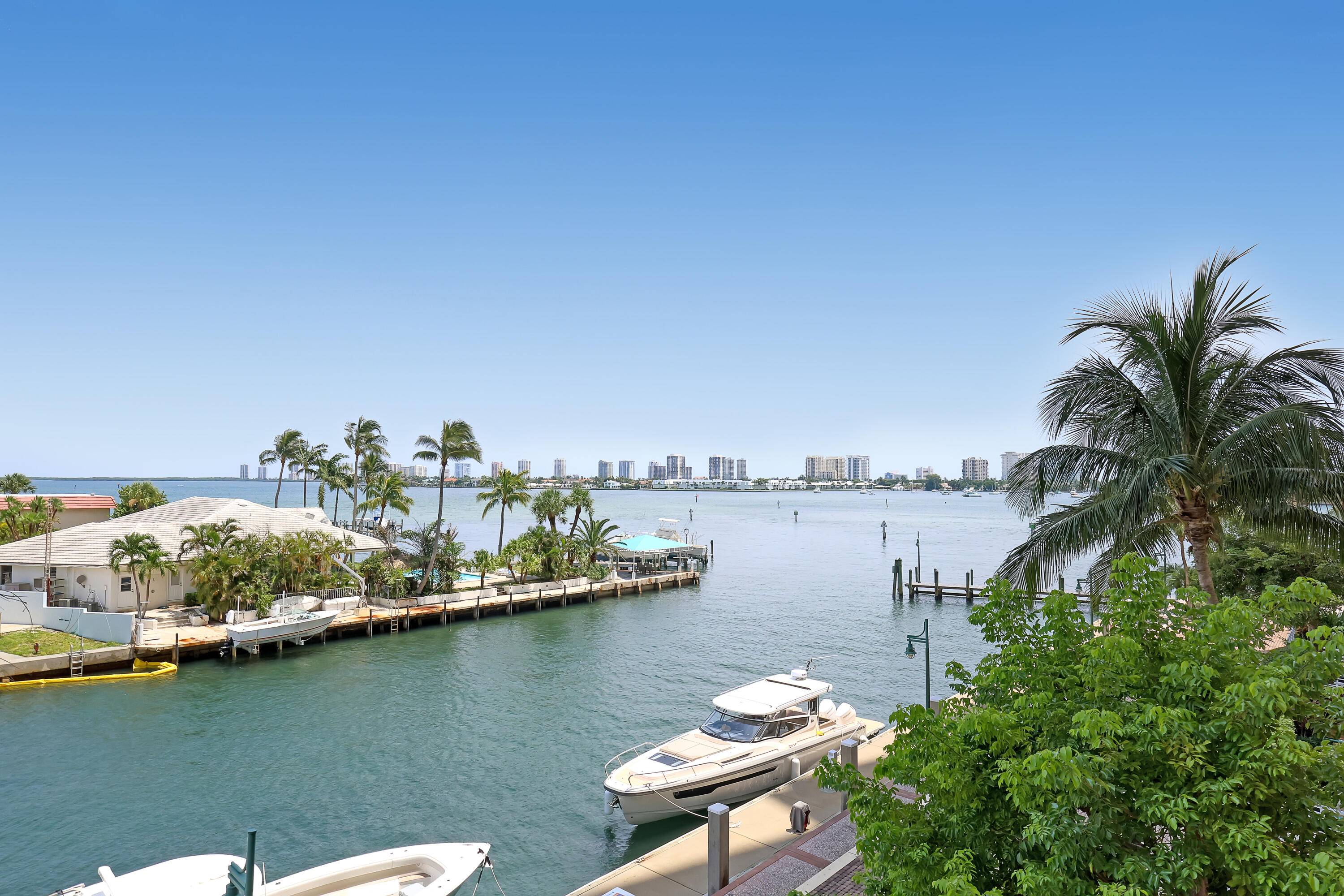Experience premier luxury waterfront living in this stunning 3rd floor Marina Grande corner unit.
