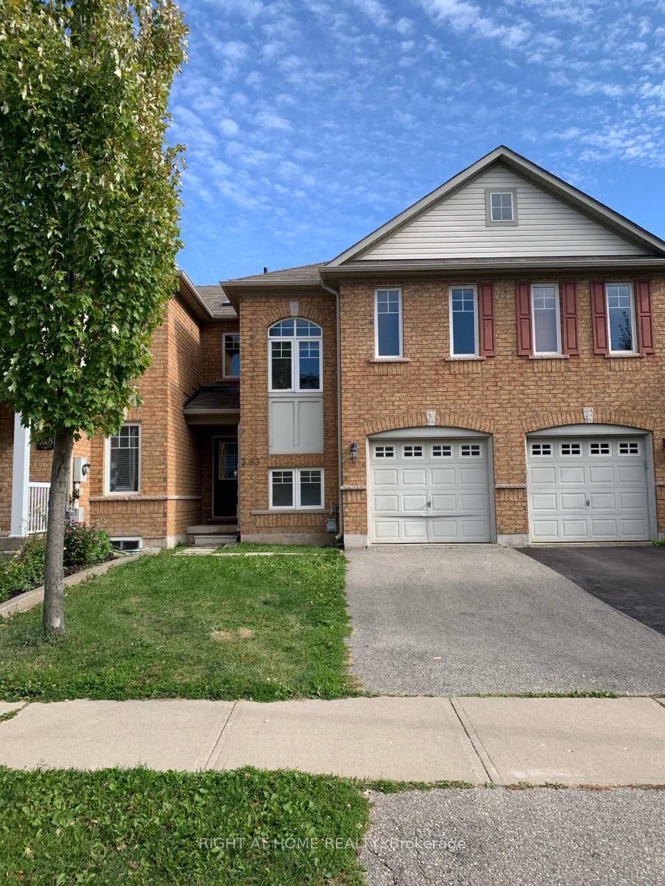 Bright Spacious 2 Storey Townhome in Sought After Bronte Creek !
