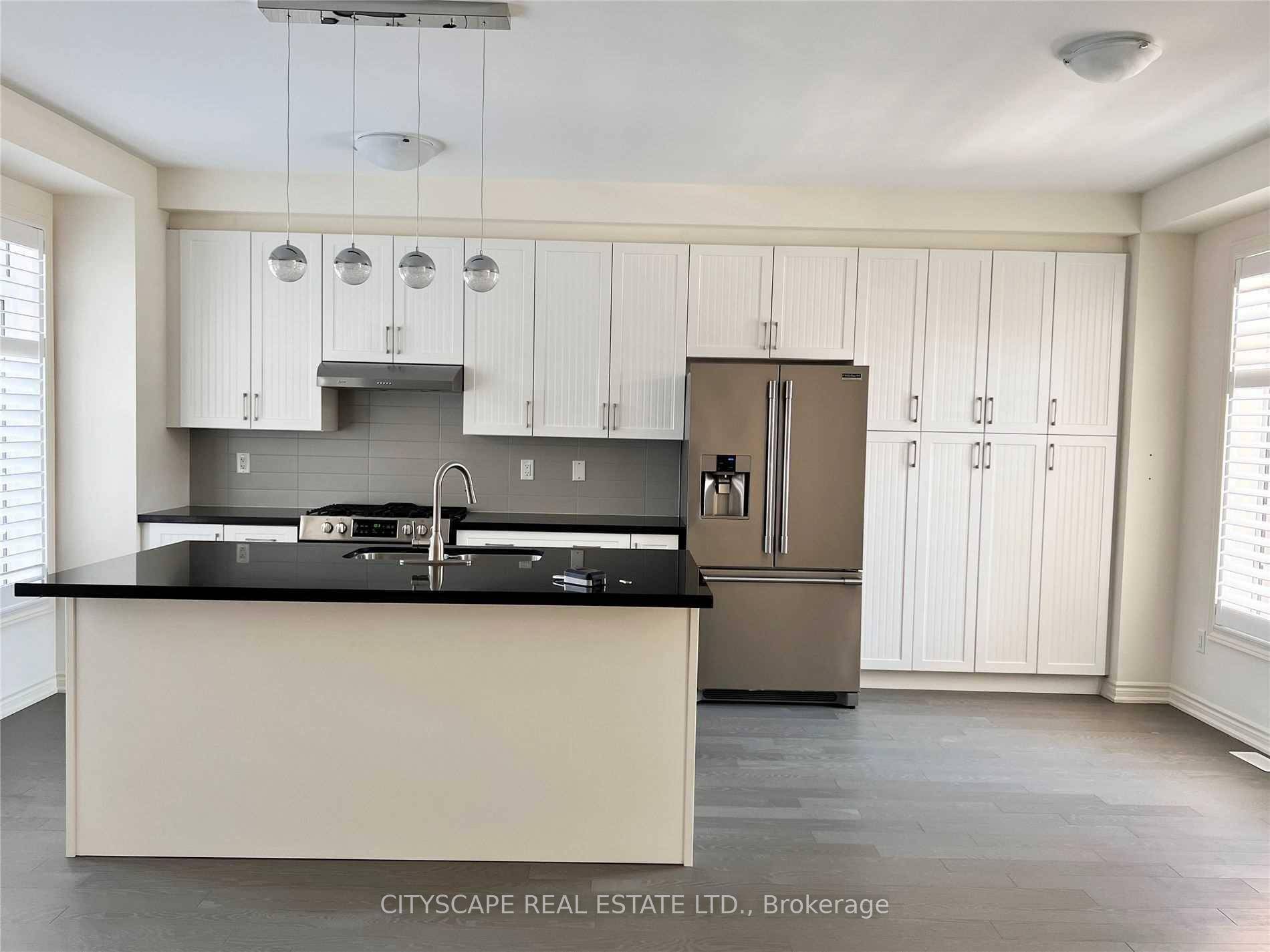 Absolutely Stunning, 2 Storey Townhome With An Open Concept Layout And Sun Filled, With Double Car Garage !