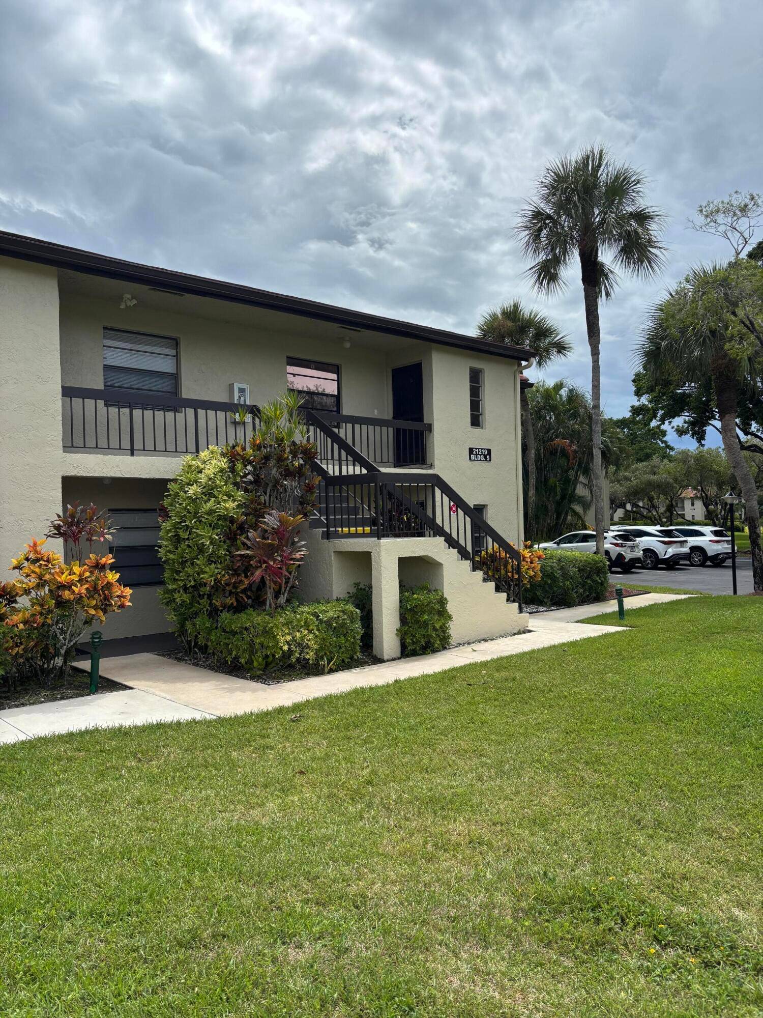 Upstairs corner for sale in very desirable 55 community of Fairways of Boca Lago.