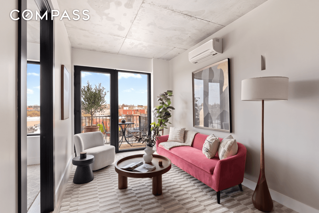 Industrial edge meets clean, modern design in this sleek, sunlit 1 bedroom home office condo at The Newkirk.