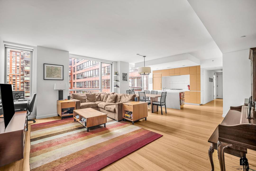 Expansive split two bedroom two bathroom available in the sought after Riverhouse, the only water front LEED certified Green condominium in North Battery Park West Tribeca.