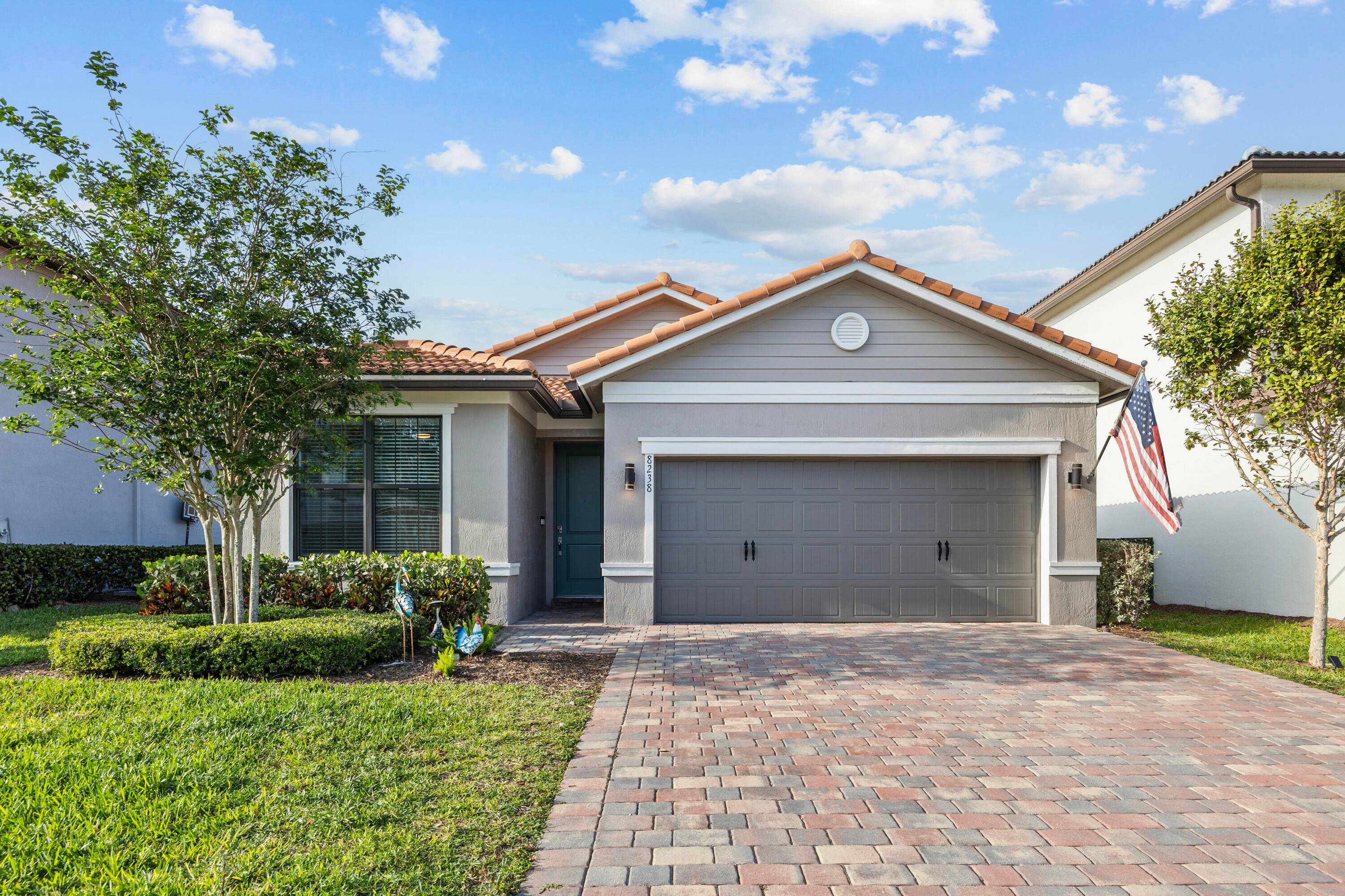 Welcome to this beautifully updated home, hurricane impact windows doors, featuring a freshly painted exterior and a welcoming open concept layout offers a spacious kitchen with granite countertops, backsplash, stainless ...